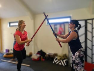 Stick balance drills (Wild Women Wellness Workshop: Body Being)
